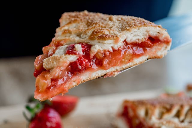 A slice of strawberry rhubarb pie