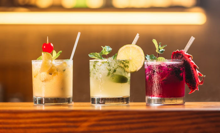 A collection of cocktails made with fruit puree