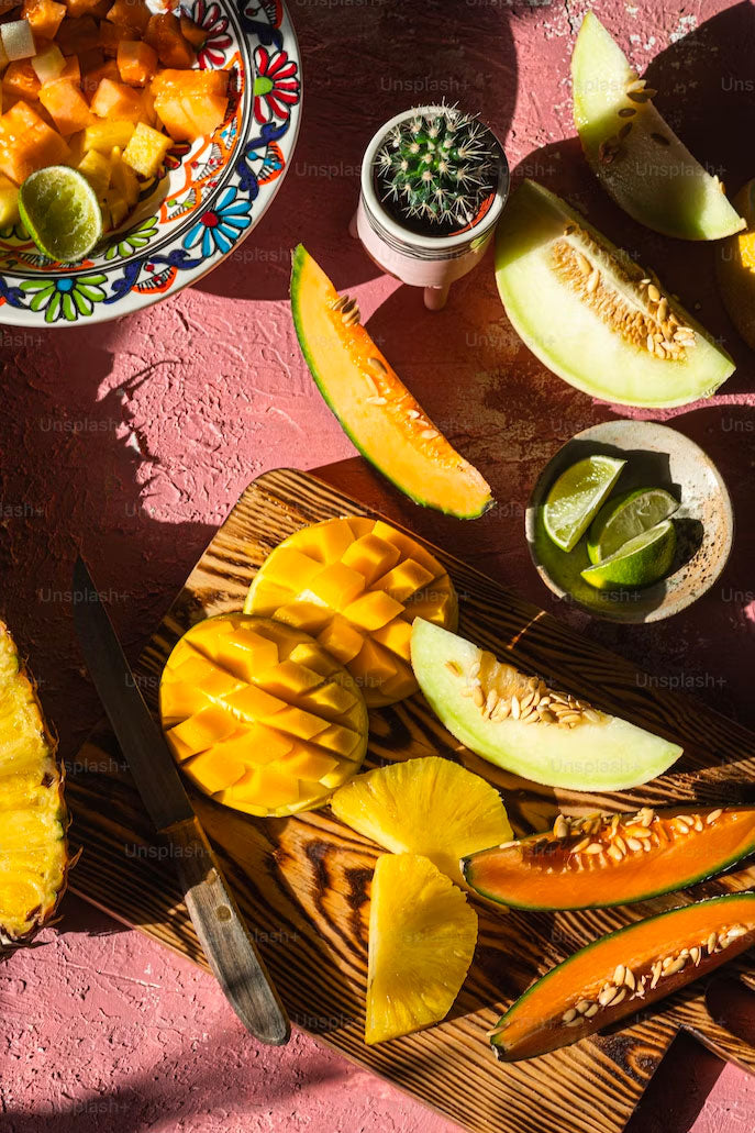 mango and melon fruits cut up